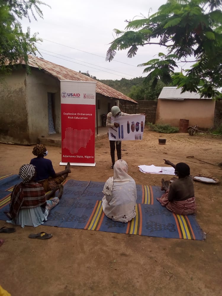 Unexploded ordnance risk education in  Michika for women.