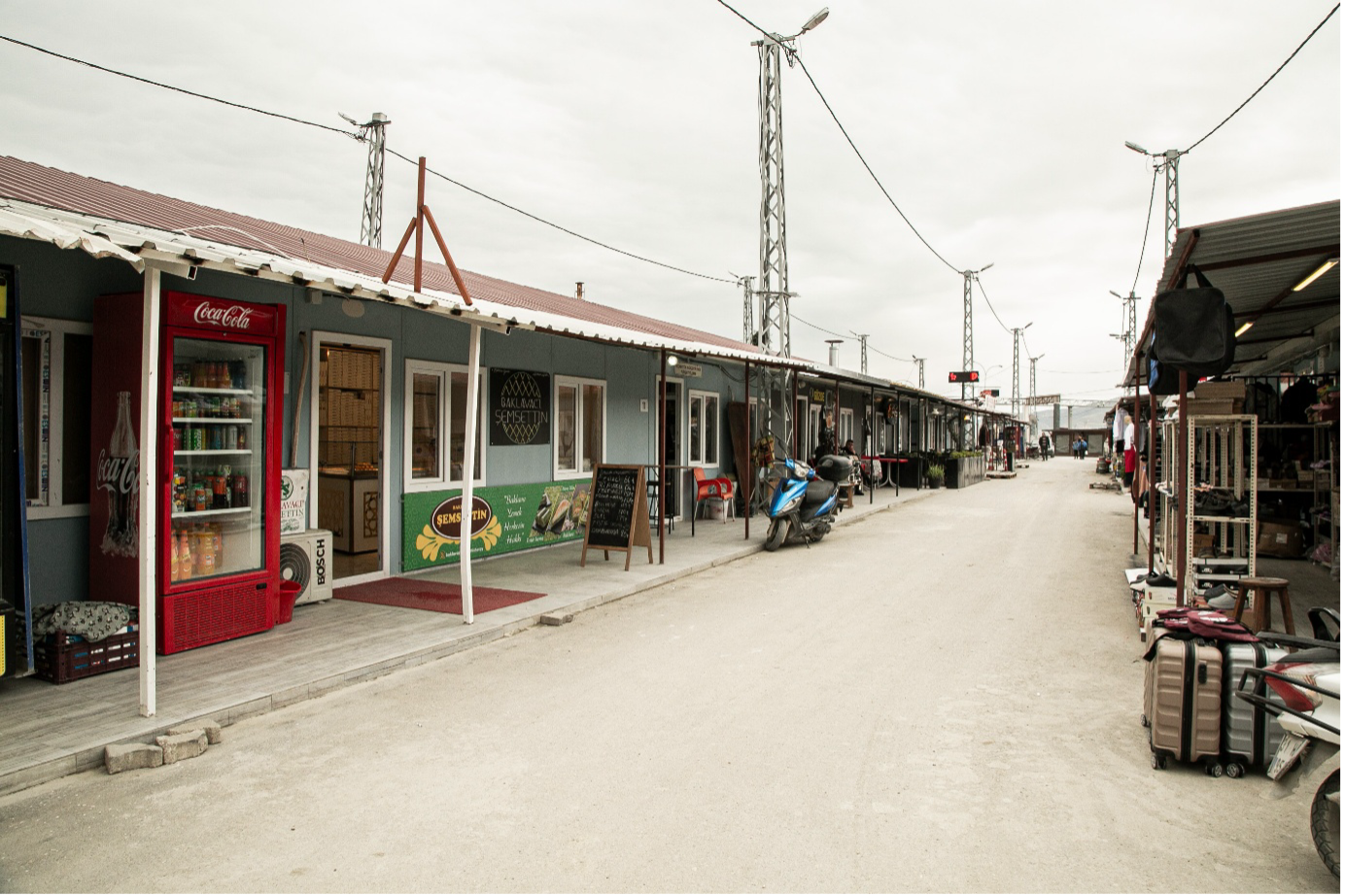 Temporary shop structures in Hatay established following the February 2023 earthquakes provide displaced business owners with a space to restore their livelihoods and serve local communities in the affected region.